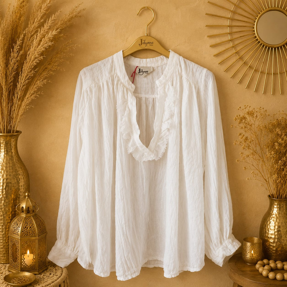 BLOUSE UNIE À VOLANT